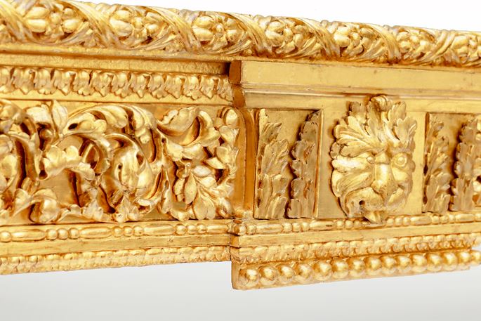 An Italian neoclassical carved and gilded wood console table, with a rectangular Verde Alpi marble top. | MasterArt